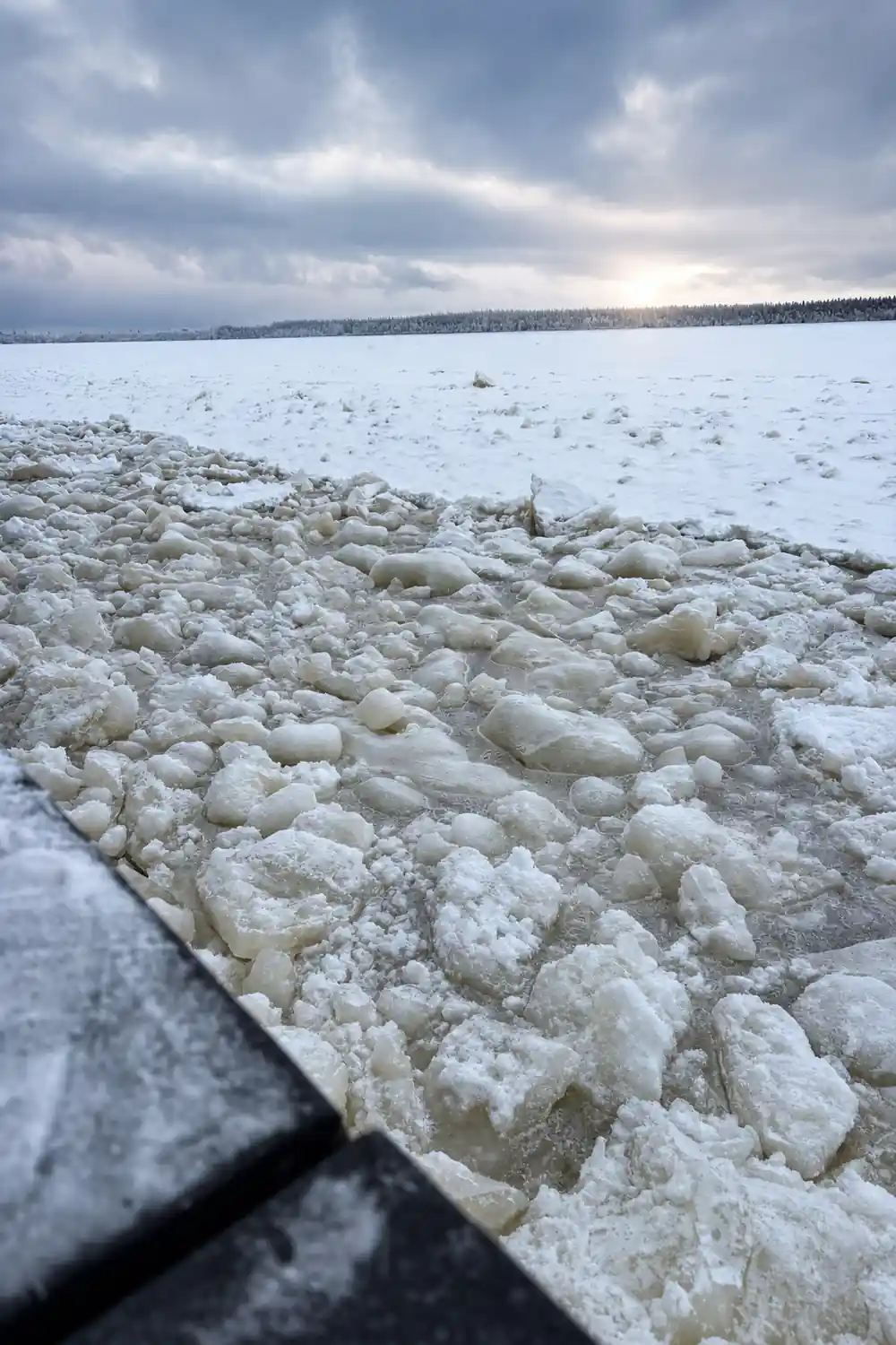 Rough pancake ice crowded against the hull